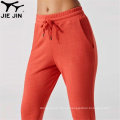 Jiejin Fabricante OEM Women Women Workout Sweing Pantalones Ajudicias transpirables Mujeres Pantalones de corredores ajustados